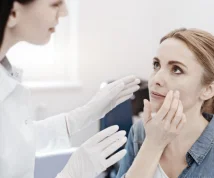 Patient being examinated by her doctor